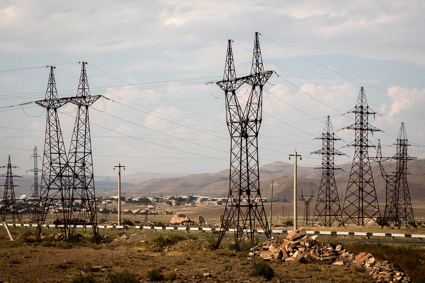 A humming troop of pylons in the lowlands.