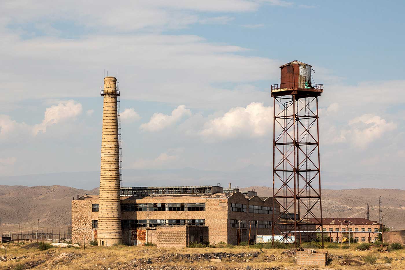 Remnants of past industry lay scattered about the plains.